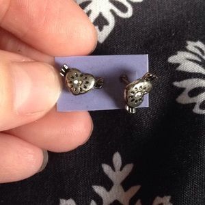 A pair of heart earrings